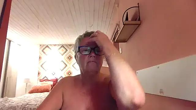 Photos of Mystery-Grandmother from StripChat is Freechat